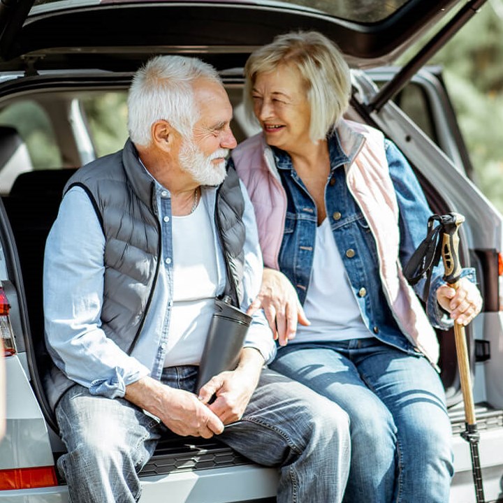 Couple sitting outside before hike